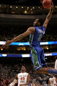 Florida Gulf Coast guard Bernard Thompson is about unleash a vicious dunk during a 17-0 run in the Eagles win over San Diego State in the Third Round of the NCAA Tournament. Photo by Webster Riddick 
